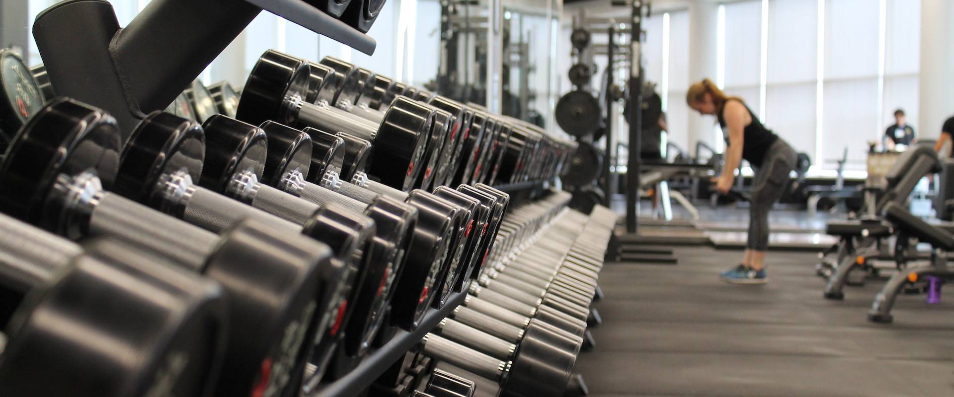 gym room with someone lifting weights